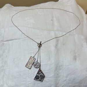 Silver Pendant Necklace with Abstract Charms